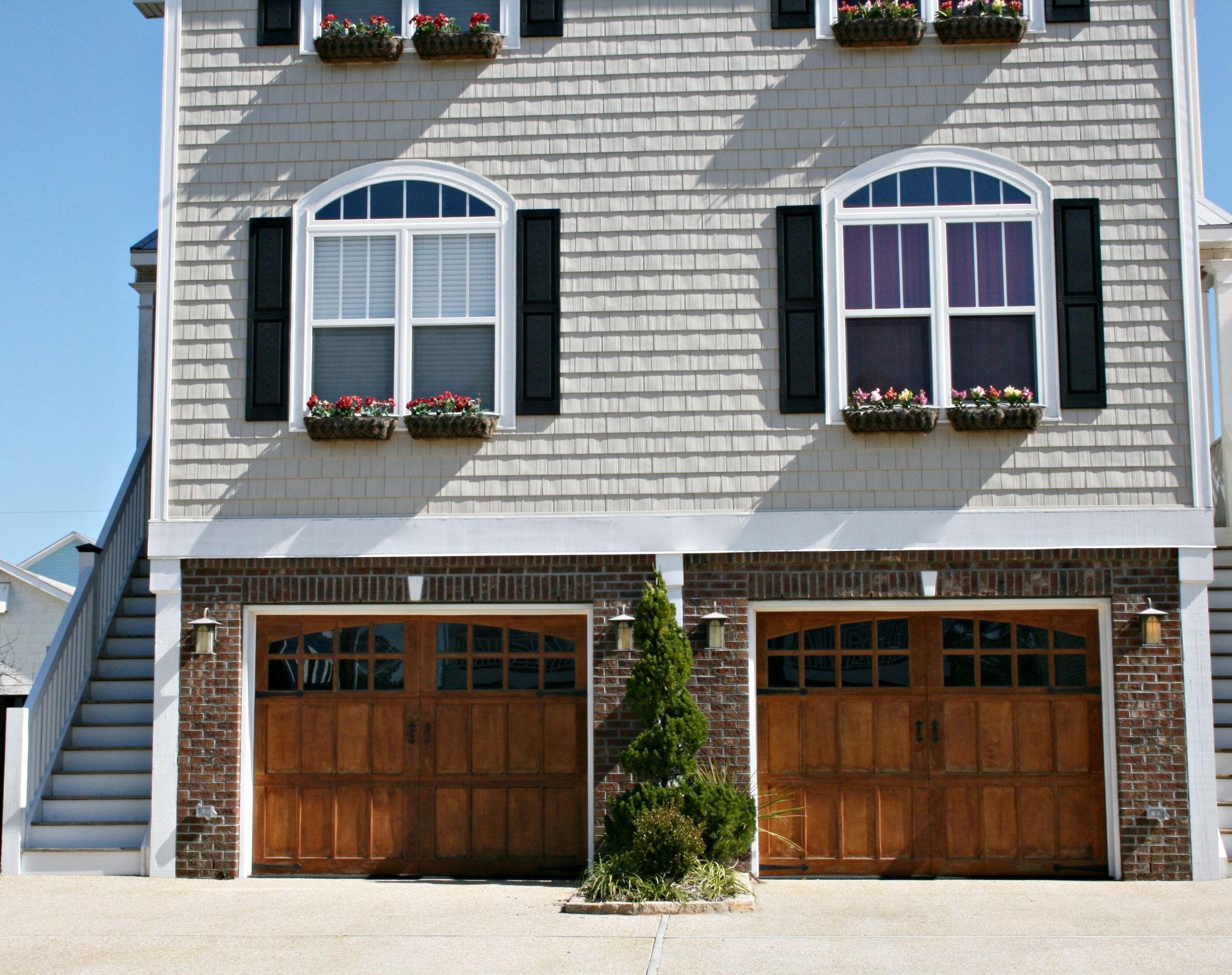 Add Curb Appeal and Increase Resale Value With Custom Garage Doors